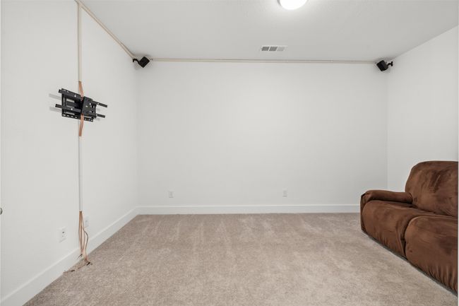 Sitting room with light carpet, baseboards, and visible vents | Image 27