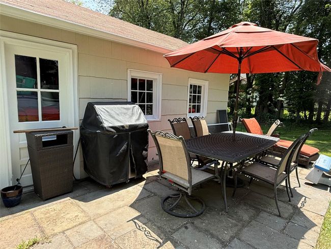 Stone patio space perfect for outdoor dining and relaxing. | Image 28