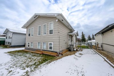 10511 102 Ave, Home with 6 bedrooms, 2 bathrooms and 4 parking in Grande Prairie AB | Image 1