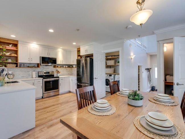 Dining area featuring recessed lighting, light wood-style floors, crown molding, and washer / clothes dryer | Image 14