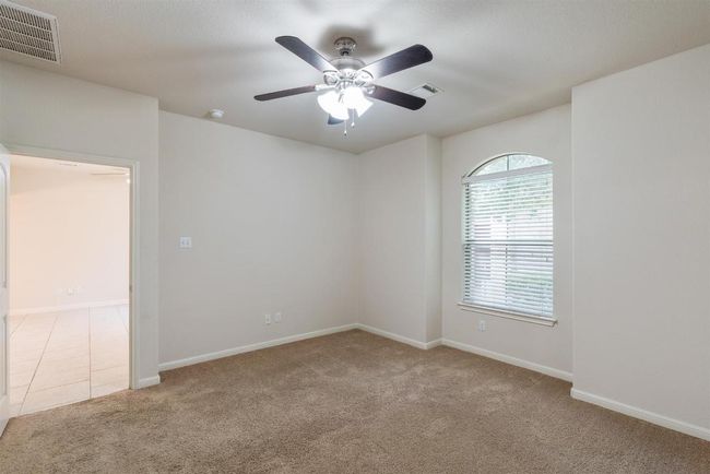 Another view of the primary bedroom. Door leads to the living space. | Image 26