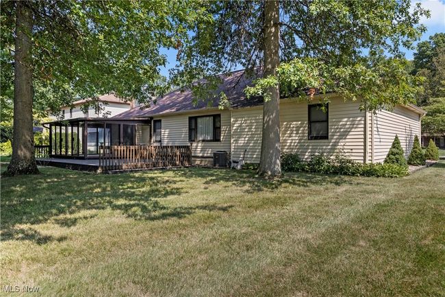 Back of property featuring a yard and deck | Image 36