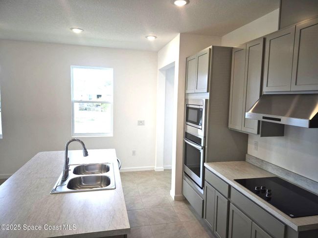 1125 Canfield Cir Se, House other with 3 bedrooms, 2 bathrooms and null parking in Palm Bay FL | Image 5