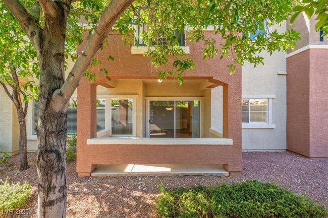 Seamless indoor-outdoor living with a private patio—perfect for relaxing and savoring your morning coffee in peace. | Image 4