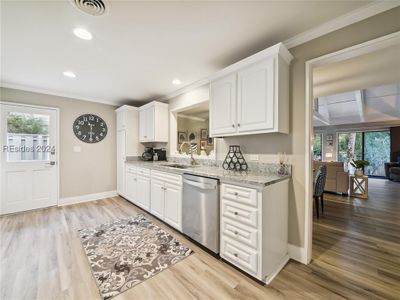 Lots of room in this remodeled kitchen. Opens to Great Room. Granite and new cabinets | Image 3