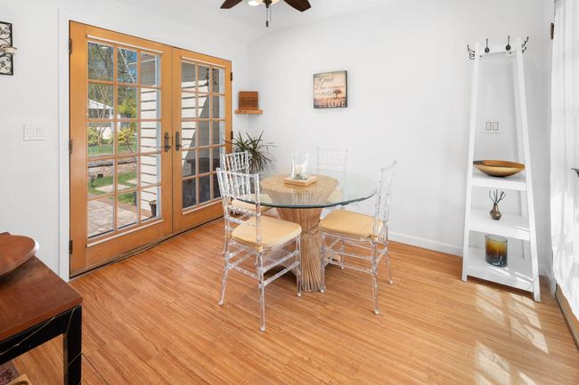 Dining area with ceiling fan, light hardwood / wood-style floors, and french doors | Image 8