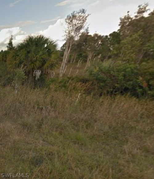 1009 Bell Blvd S, LEHIGH ACRES, FL, 33974-0838 | Card Image