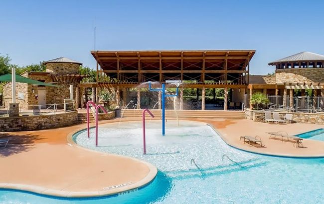 Community pool featuring a patio area | Image 34