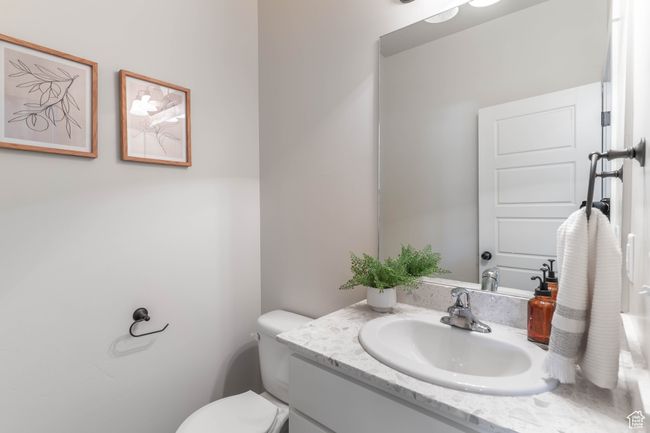 Half bath by garage entrance | Image 24