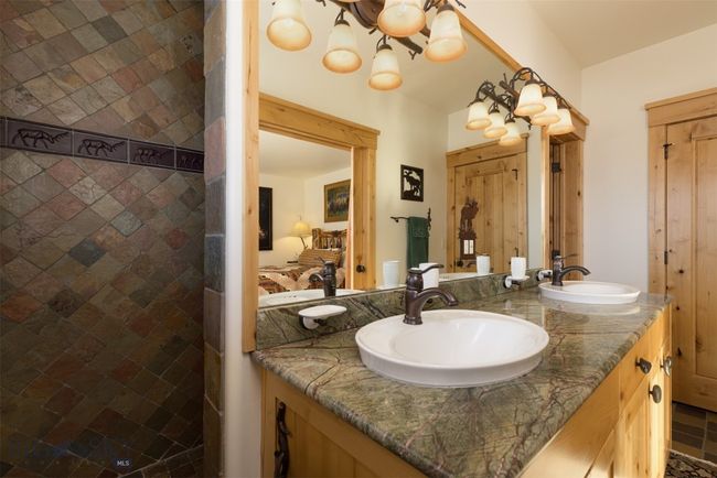 Entry level Bathroom 2 vanity and shower entrance. | Image 59