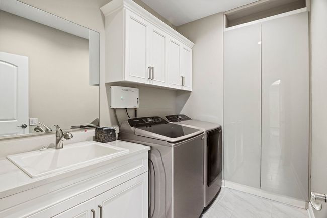 Built-in Storage Closet and Sink with Vanity | Image 17