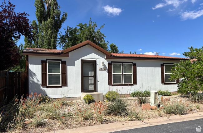 View of front facade featuring metal roof | Image 52