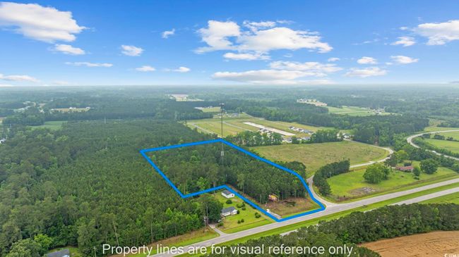 Overview of rural landscape featuring property boundaries highlighted and a forest | Image 14