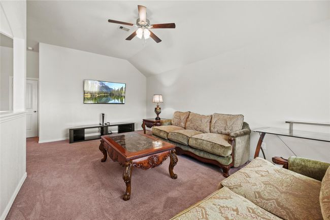 Modern living not only requires flex space but it demands it. Utilize the massive upstairs game room as a home gym, telecommuting office, or a dedicated homeschooling/distance learning room. | Image 28