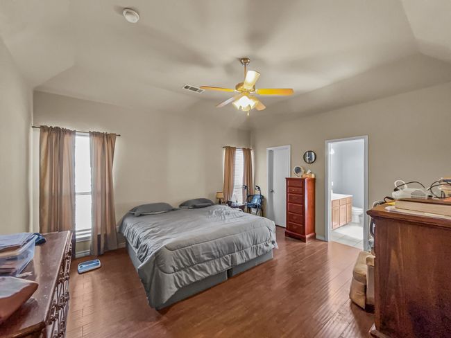 Large primary bedroom on 1st floor with walk-in closet & en-suite bath | Image 11