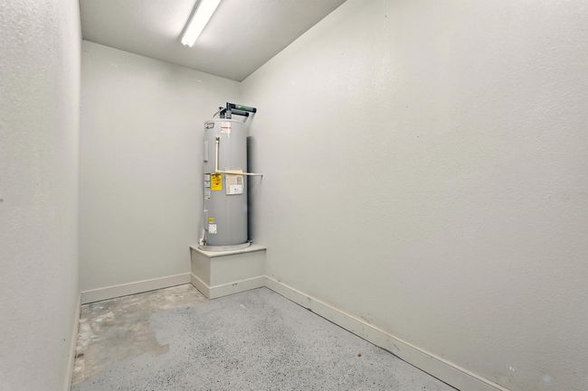Storage room off garage | Image 33