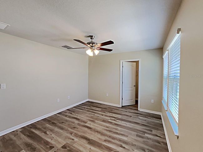 7603 Pool Compass Loop, House other with 4 bedrooms, 3 bathrooms and null parking in Wesley Chapel FL | Image 9
