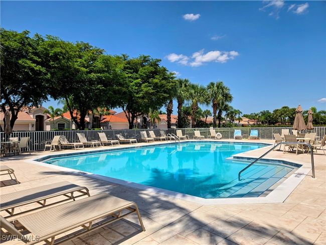 Jasmine point Community pool with a lounging area | Image 36