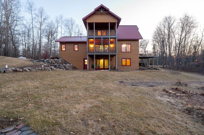 A walkout lower level allows for easy access to the grounds. | Image 7