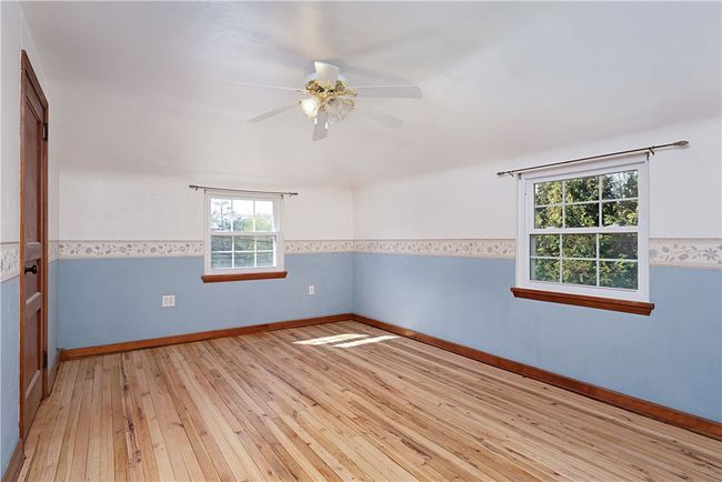 Bedroom 1: 11x14. 2nd floor, front left corner of house. | Image 16