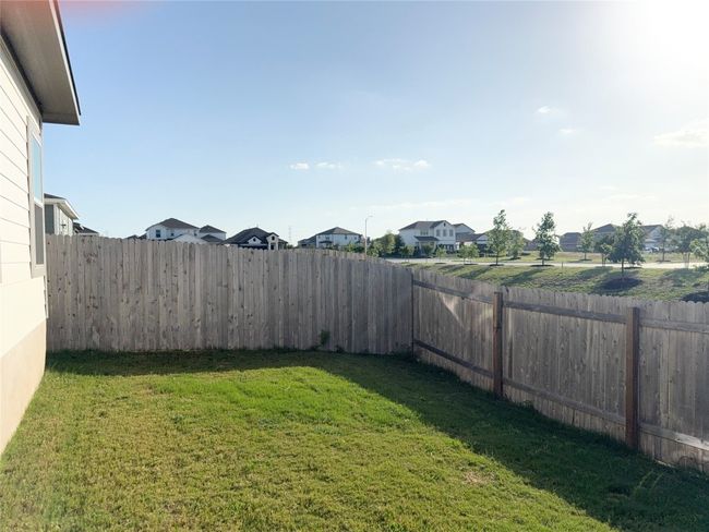 View of yard featuring a residential view | Image 26