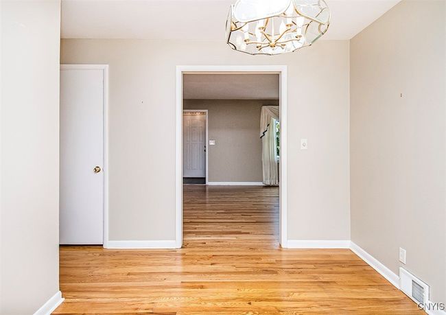 A perfectly sized formal dining room... | Image 13