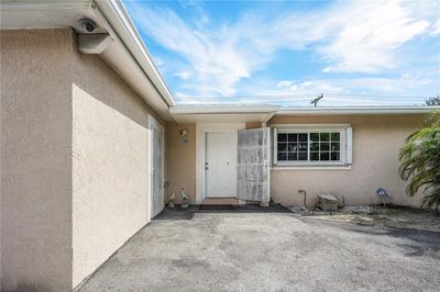 Front entrace, seperate entrance on the left to 4th bedroom | Image 2