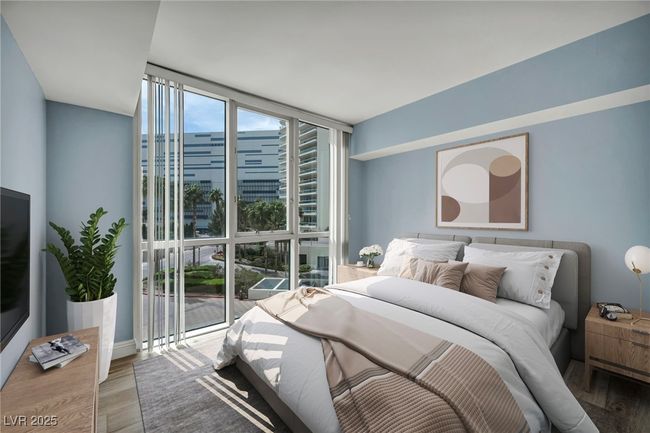 Virtually Staged Bedroom featuring wood finished floors, floor to ceiling windows, and a view of city | Image 49