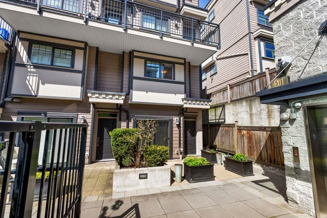Exterior space featuring elevator, a balcony, and fence | Image 24