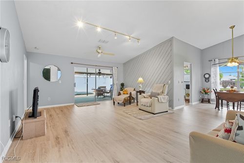 9749 Maplecrest Cir, LEHIGH ACRES, FL, 33936-5950 | Card Image