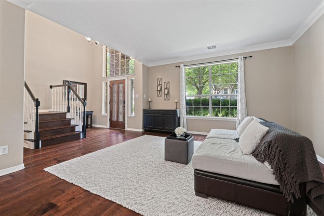 With its gentle natural light and subtle separation from the rest of the home, this front living area is the kind of space that easily adapts—comfortable, calm, and ready for whatever you make of it | Image 6