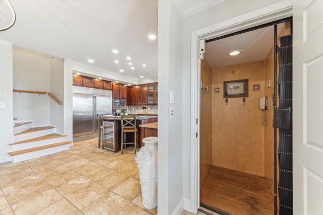 Experience ultimate convenience with a private elevator connecting all levels of this home. | Image 9