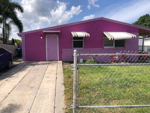 1052 W 26th St, Riviera Beach, FL, 33404-4149 | Card Image
