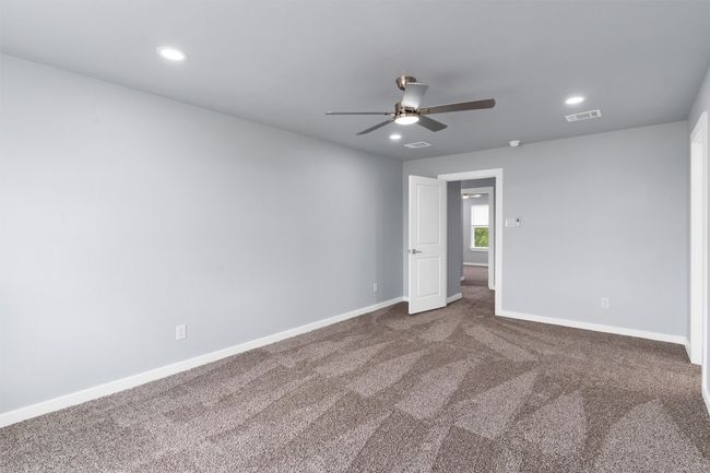 Unfurnished room with a ceiling fan, carpet floors, and recessed lighting | Image 27