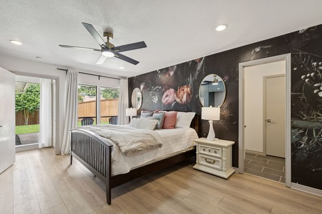 Primary bedroom with fun accent wall | Image 13