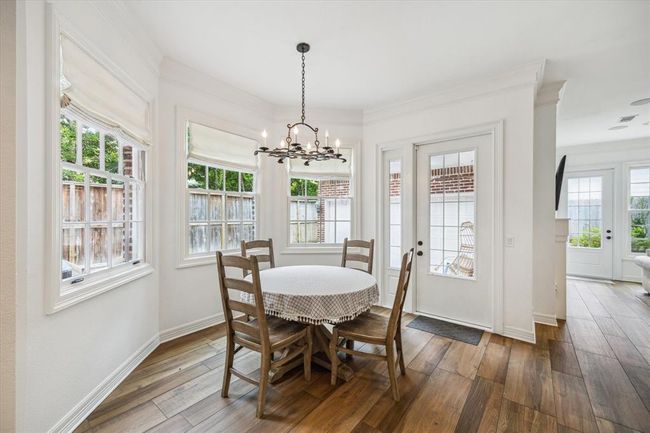 Breakfast area overlooks the drive. Area is large enough for a 6-8 seated table as well. Lots of natural light in this room. | Image 12