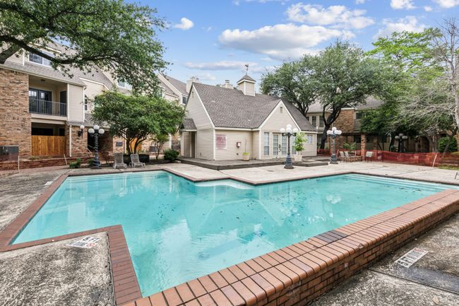 Community pool with a patio | Image 30