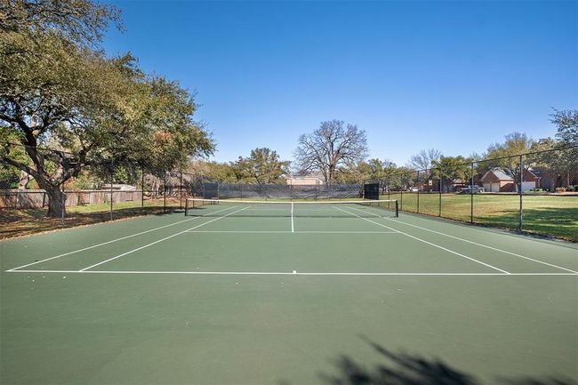 View of tennis court featuring community basketball court | Image 38