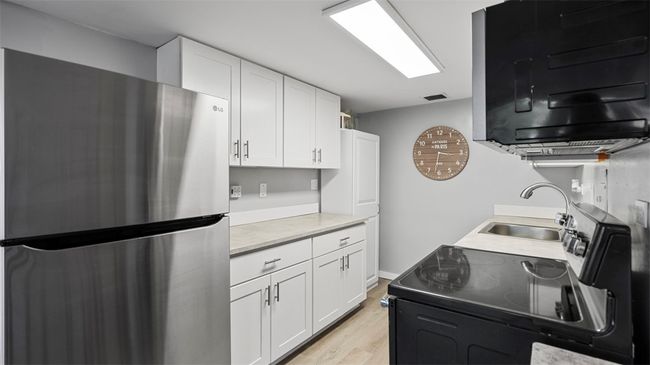 New cabinets, flooring, counters- dreamy! | Image 8