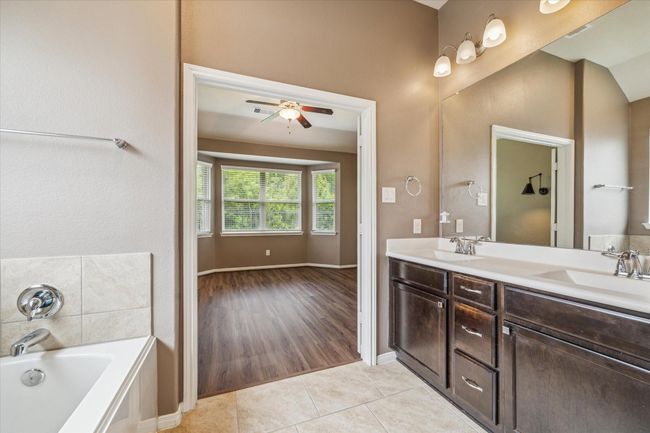 Primary Bath with Double Vanity, Seperate Shower, and Soaking Tub. | Image 25