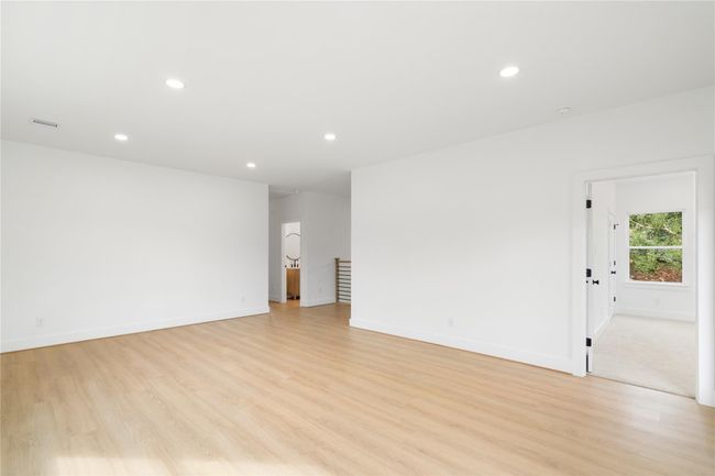 Primary bedroom is located upstairs - view from the Game room into the Primary Bedroom | Image 23