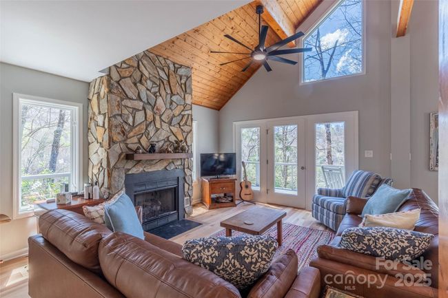 Living room with deck access main level | Image 18