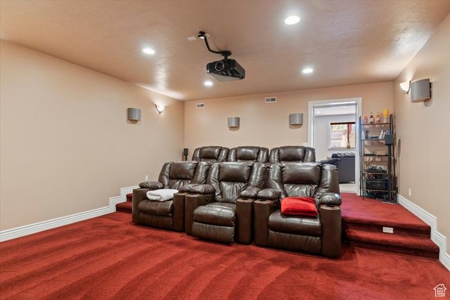 Carpeted cinema room featuring recessed lighting, baseboards, and visible vents | Image 24