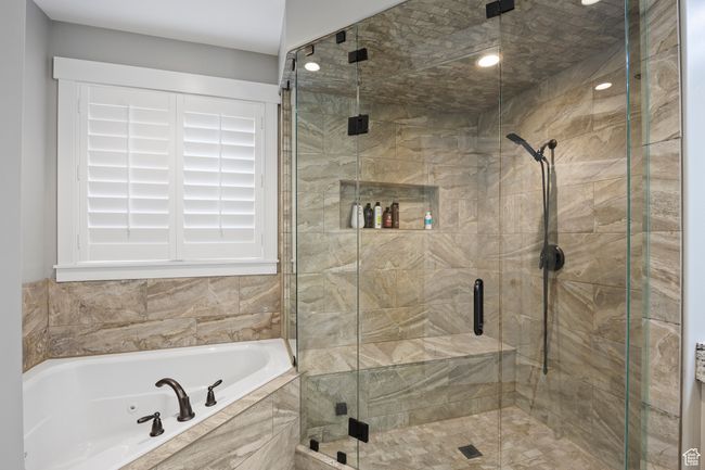 Full bathroom with a oversize jetted tub, a steam shower, and recessed lighting | Image 33