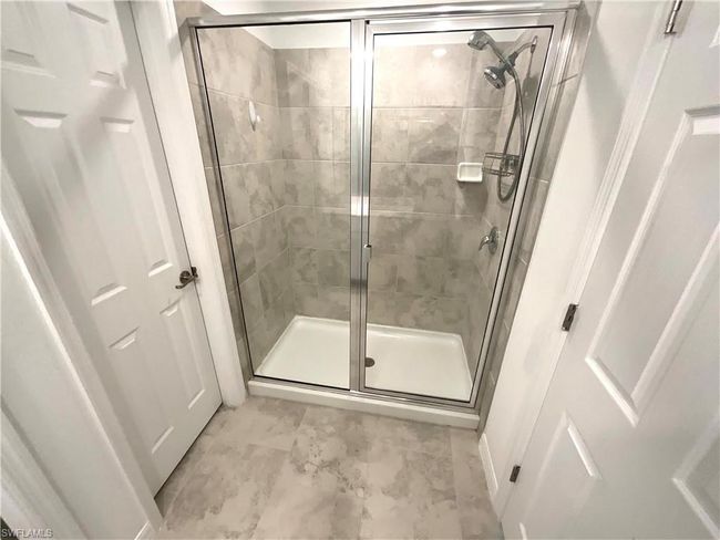 Full bath featuring a stall shower | Image 13