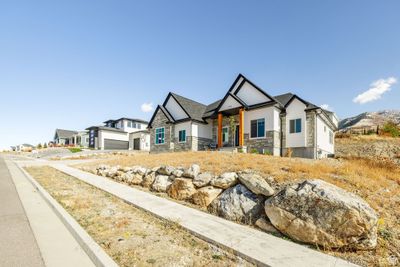 View of front of house featuring a garage | Image 3