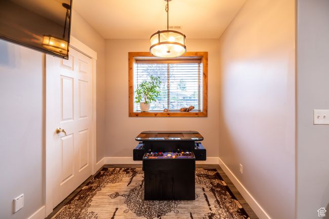 Office area with baseboards and wood finished floors | Image 42