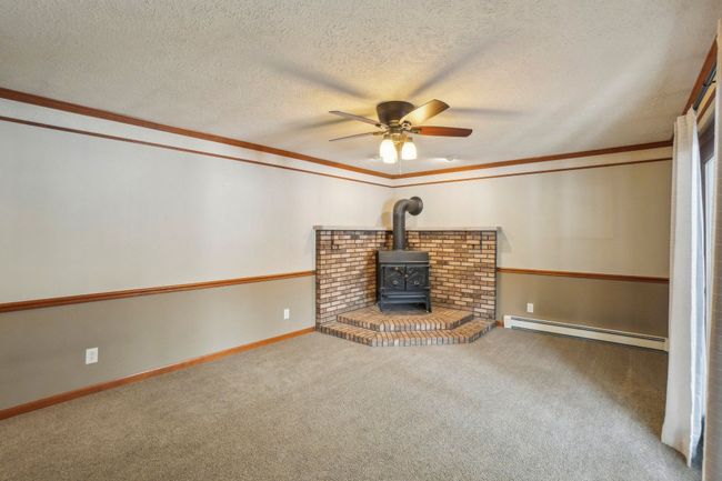 Family Room with wood stove. | Image 5