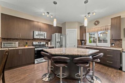 428 Rainbow Falls Dr, Home with 3 bedrooms, 2 bathrooms and 2 parking in Chestermere AB | Image 1