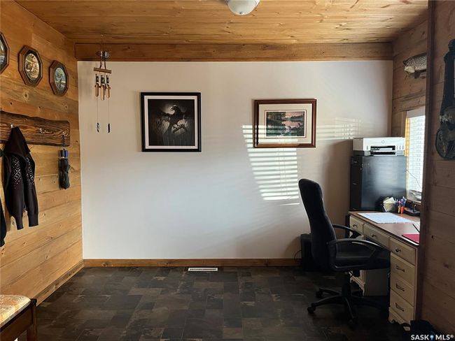 Office space featuring wooden ceiling and wooden walls | Image 24